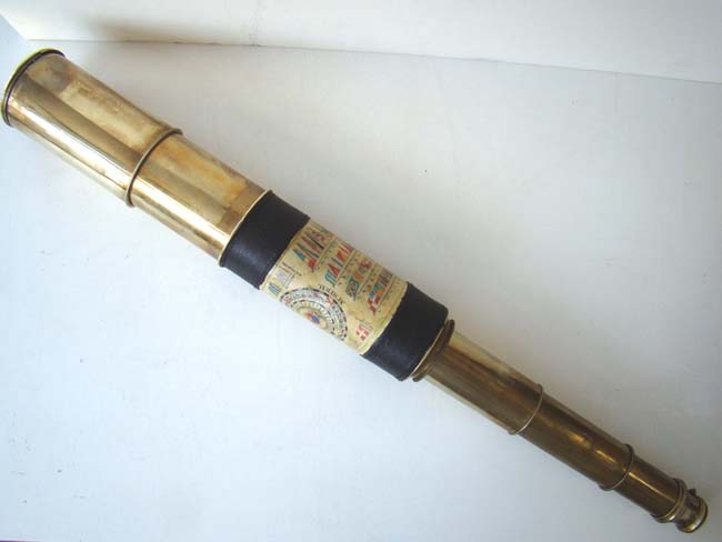 An Antique Mariner's Three-draw Telescope with inset signal flag chart by Dolland, London, circa 1850